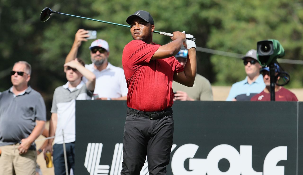 Varner III watches his tee shot as he strikes his driver