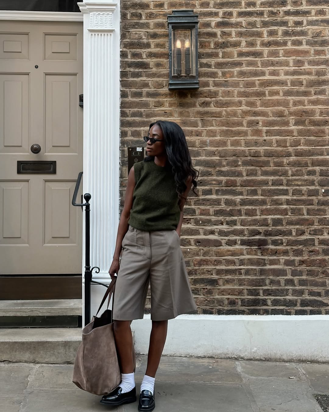 Liv in loafers and shorts