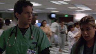 Glen Howerton walking and walking with Maura Tierney in ER