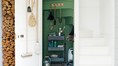 cleaning cupboard under the stairs