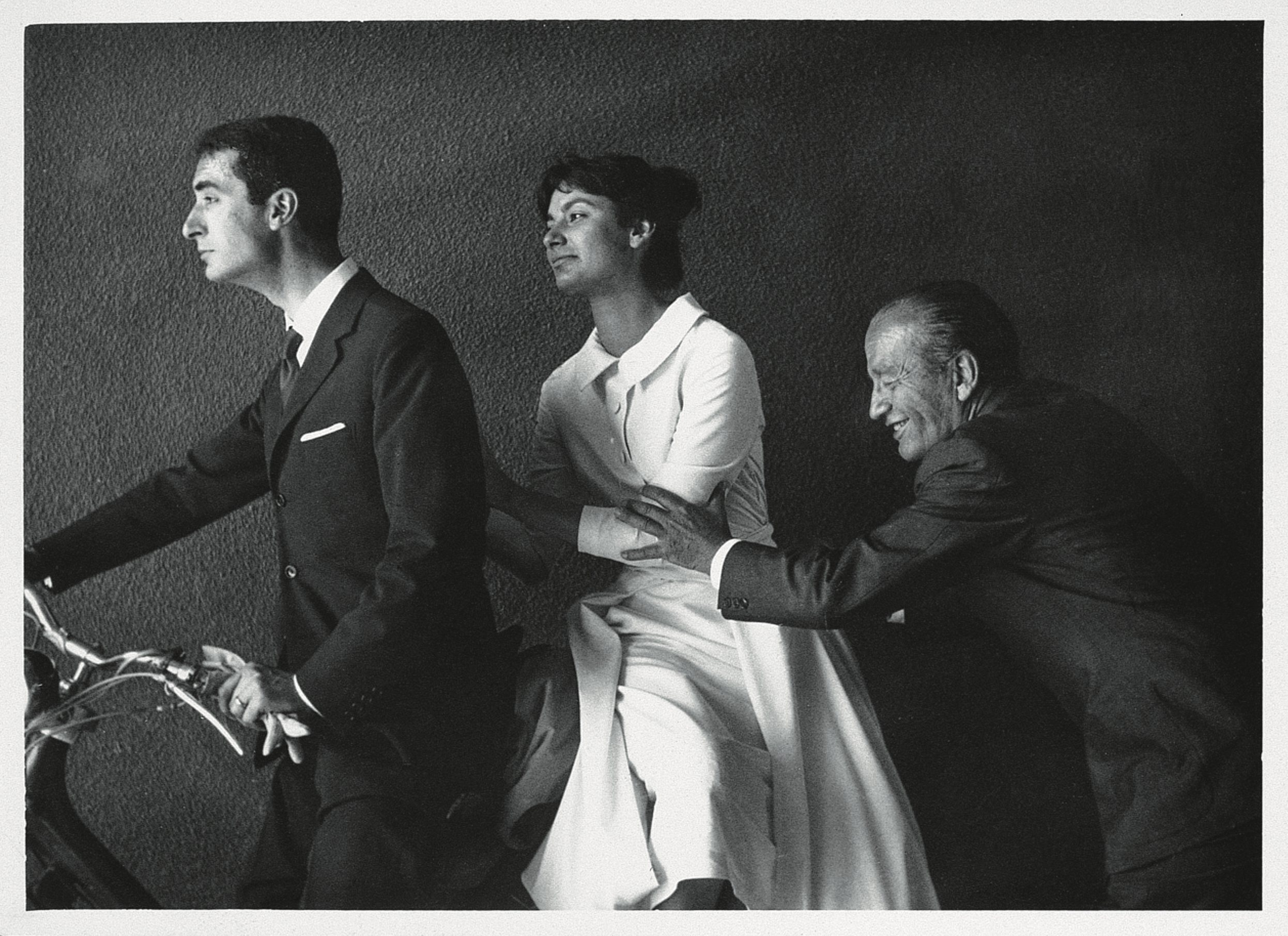 Massimo and Lella Vignelli on their wedding day with Paolo Venini