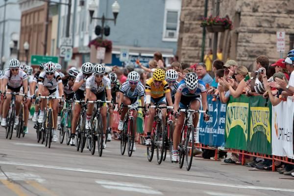 The women's field makes it into town.