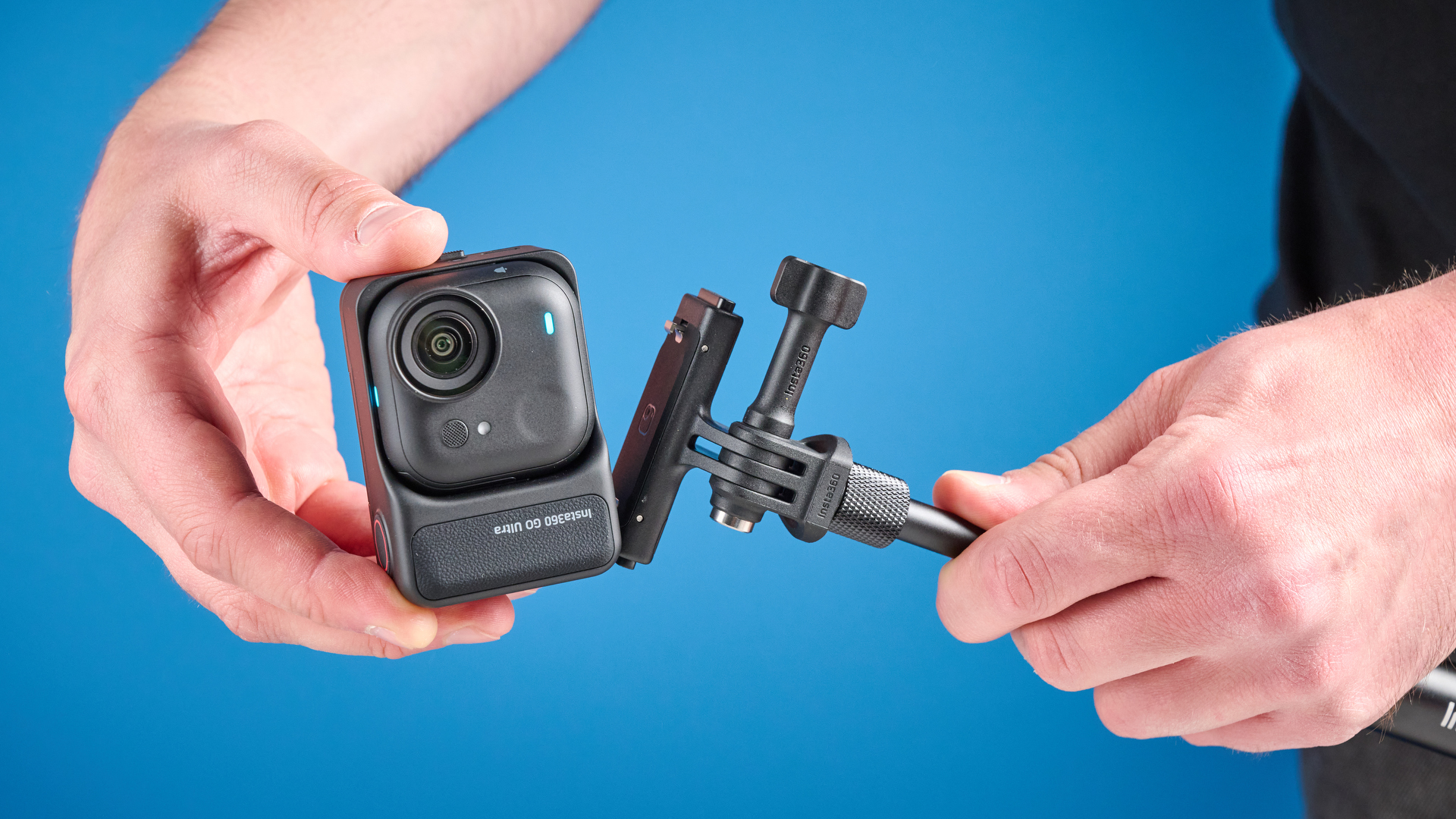 Insta360 Go Ultra being mounted in hand