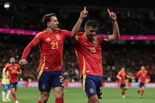 Spain Euro 2024 squad Spain's midfielder #16 Rodri celebrates scoring his team's third goal with Spain's forward #21 Mikel Oyarzabal during the international friendly football match between Spain and Brazil at the Santiago Bernabeu stadium in Madrid on March 26, 2024. Spain arranged a friendly against Brazil at the Santiago Bernabeu under the slogan "One Skin" to help combat racism. (Photo by Thomas COEX / AFP) (Photo by THOMAS COEX/AFP via Getty Images)