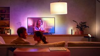 Philips Hue bulbs lighting a living room.