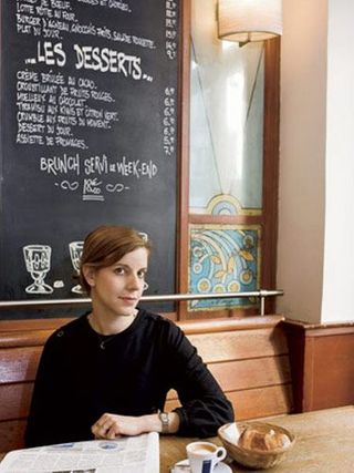 A woman sitting in a cafe