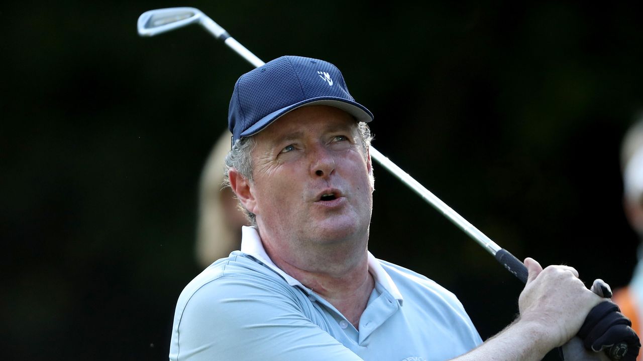 Piers Morgan watches his golf shot