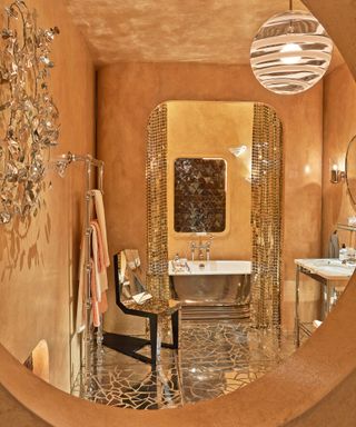 Modern bathroom with all-over gold color scheme