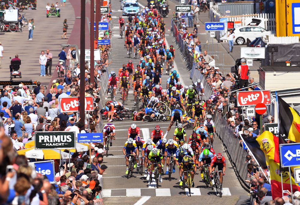 Riders are involved in a pile-up near the end of stage 1 at the Belgium Tour