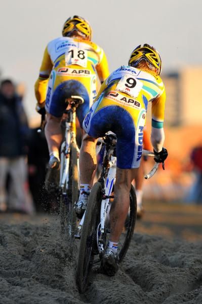 Teammates Kevin Pauwels and Bart Wellens