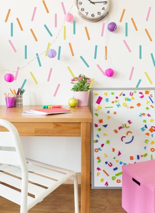 colourful home office decorated with confetti inspired wall stickers from tenivinilo