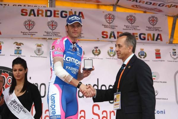 Alessandro Petacchi on the podium, he finished second to Alberto Loddo on the final stage