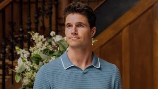 Robbie Amell in a press image for Season 3 of Upload.
