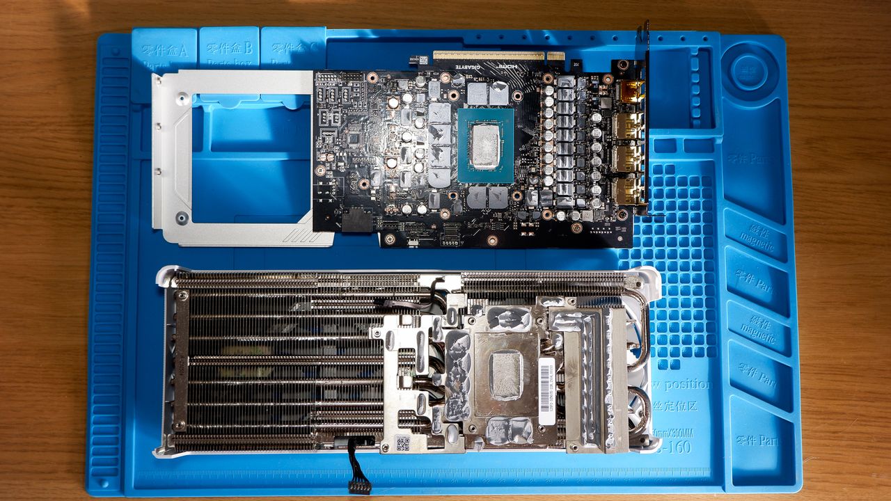 A Gigabyte RTX 5070 Ti Eagle OC Ice on a desk and installed in a gaming PC.