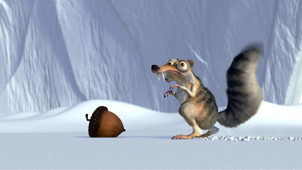 A little animal hunts a nut in the snow
