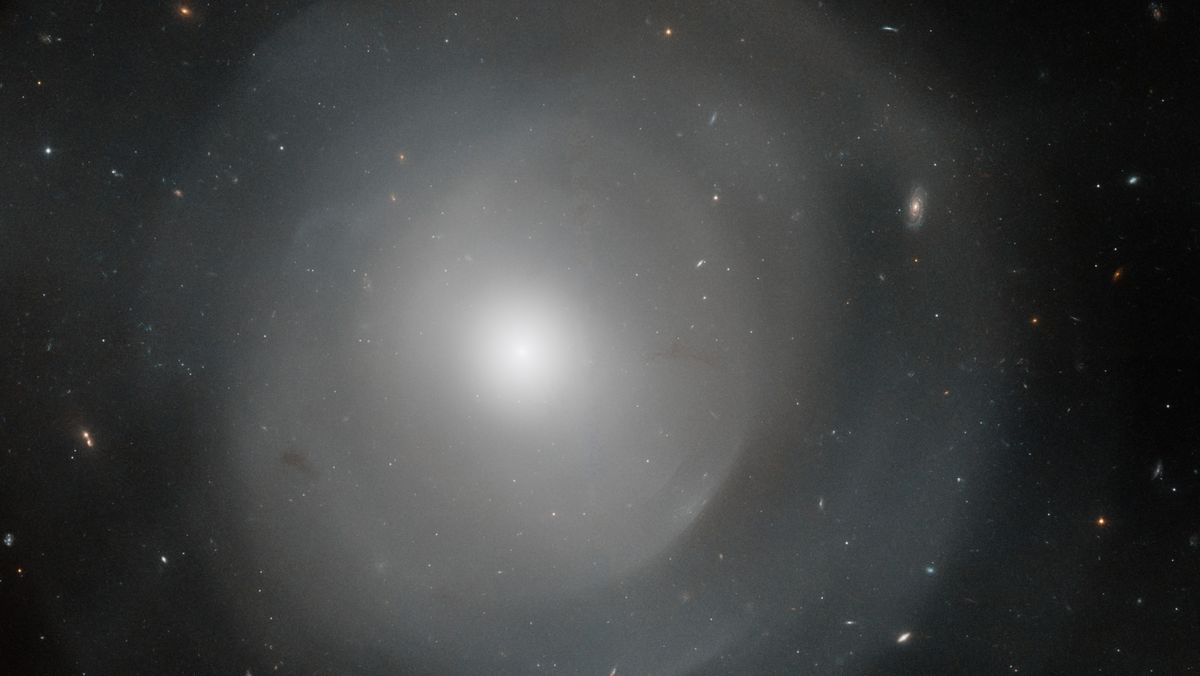 Hubble telescope spots enormous elliptical galaxy surrounded by mysterious shells