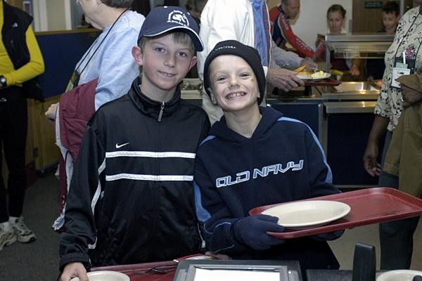 Campers came in all ages and sizes, with quite a few in the 10-12 year old range. Kamil Kieszkowski and Brian French belly up to breakfast.