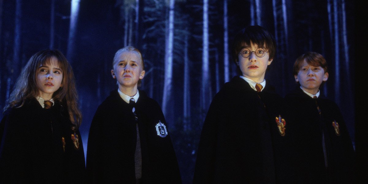 Hermione, Draco, Harry and Ron stand in the Forbidden Forest in &#039;Harry Potter and the Chamber of Secrets&#039;