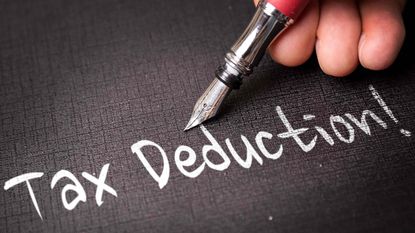 picture of the words "tax deduction" written with a fancy pen
