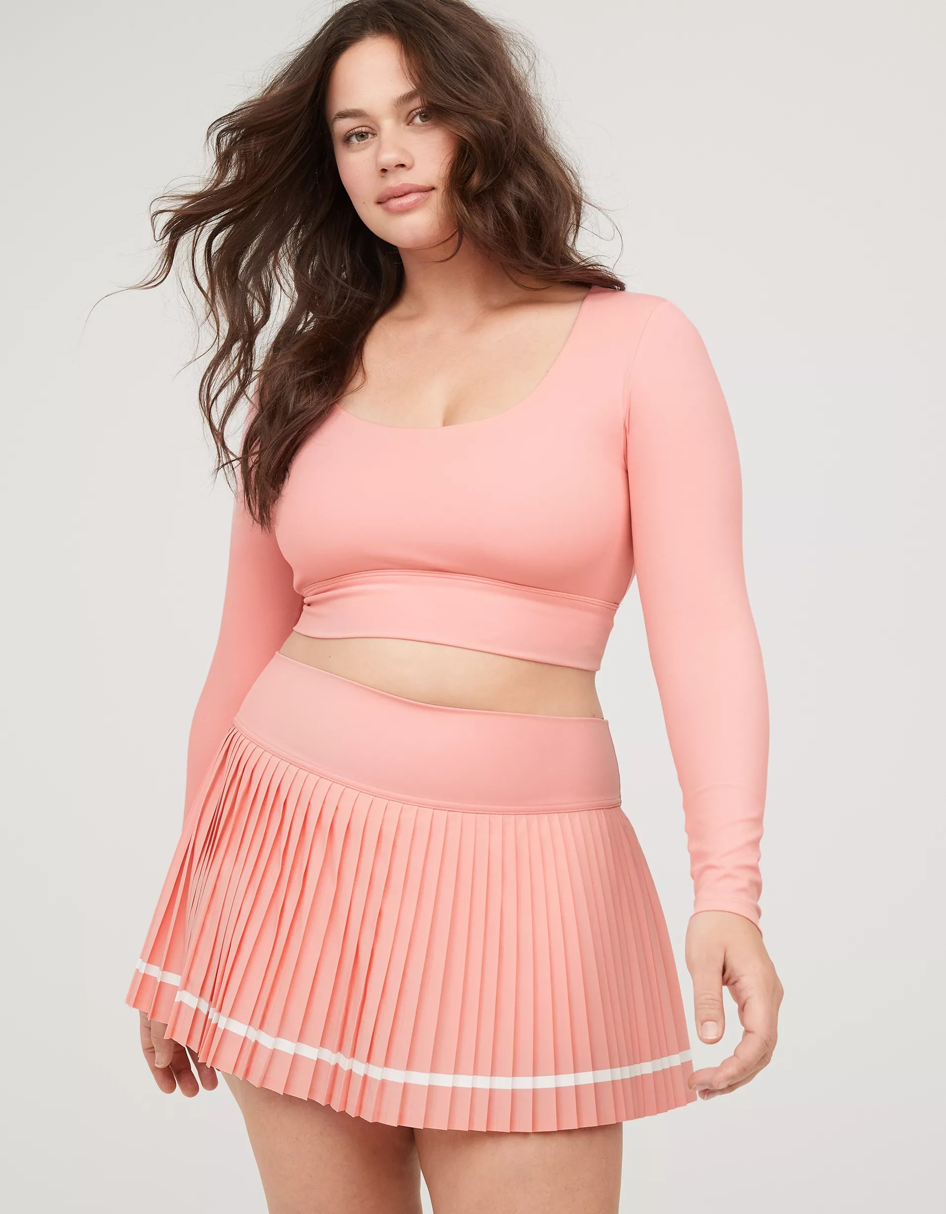 Model wearing pink activewear set