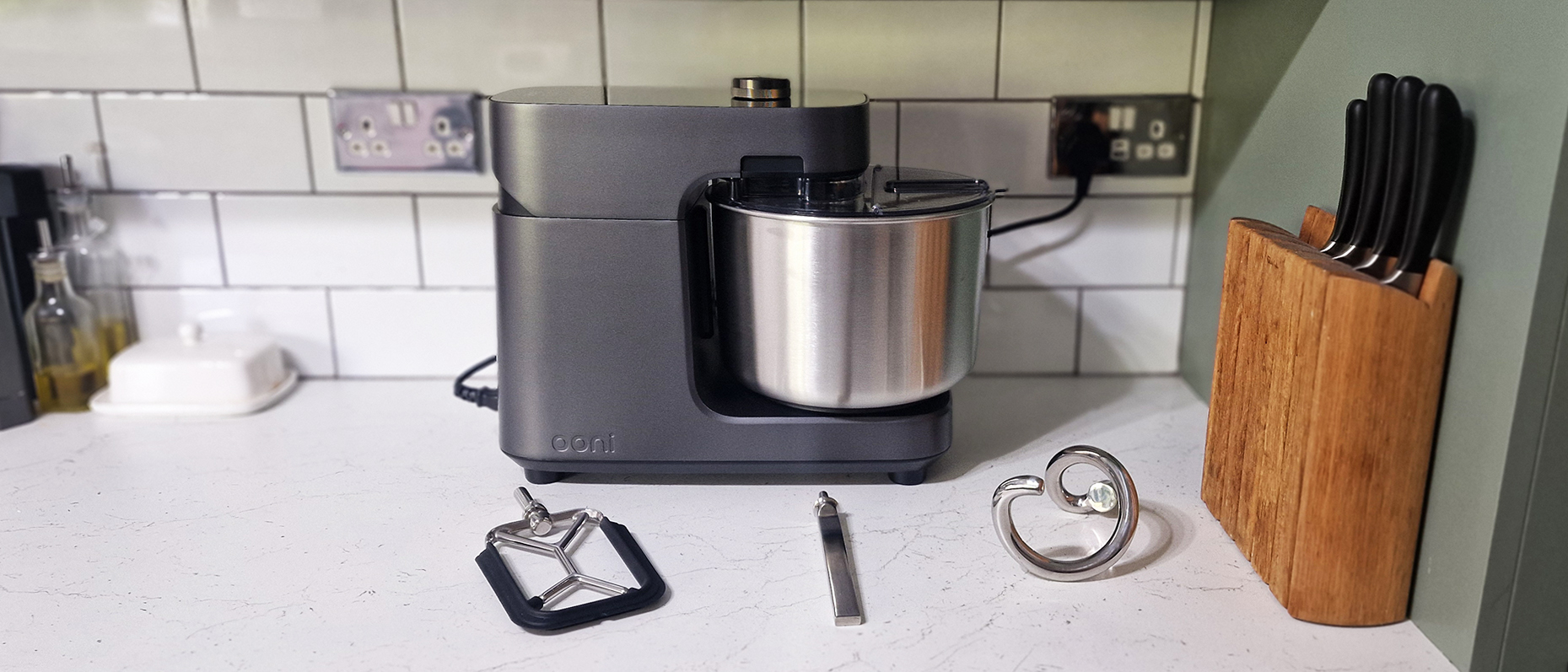 The Ooni Halo Pro Spiral mixer being tested in a green and white kitchen