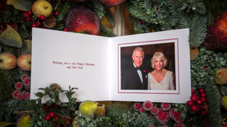 Prince Charles, Prince of Wales and Camilla, Duchess of Cornwall's 2017 Christmas card pictured in Clarence House on December 15, 2017 in London, England. The picture on the card was taken by Hugo Burnand showing the royal couple in the Orchard Room during the private 70th birthday party of The Duchess of Cornwall at Highgrove on Saturday 15th July 2017