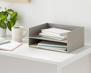 Grey letter organizer on desk