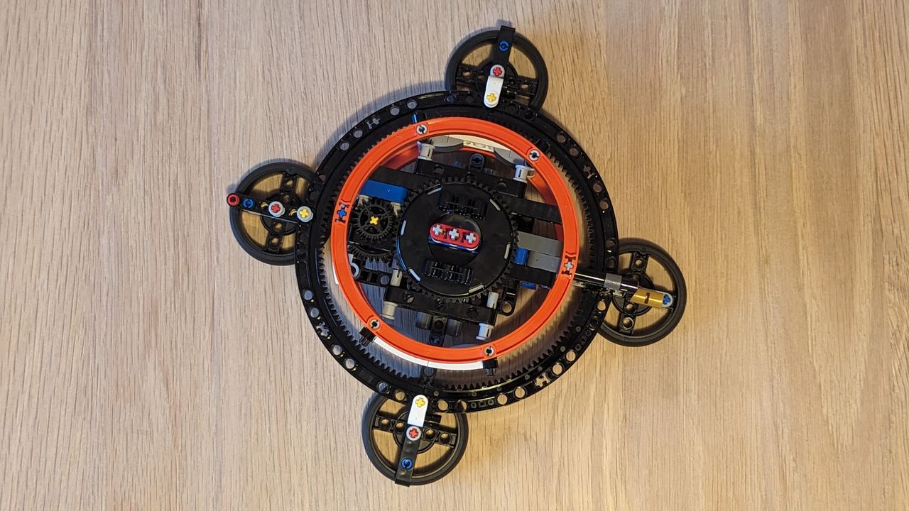 Lego technic planet earth and moon in orbit set on a white background