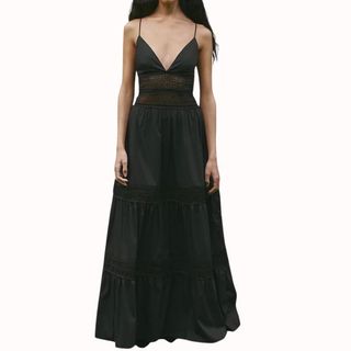 Flat lay image of a black long dress