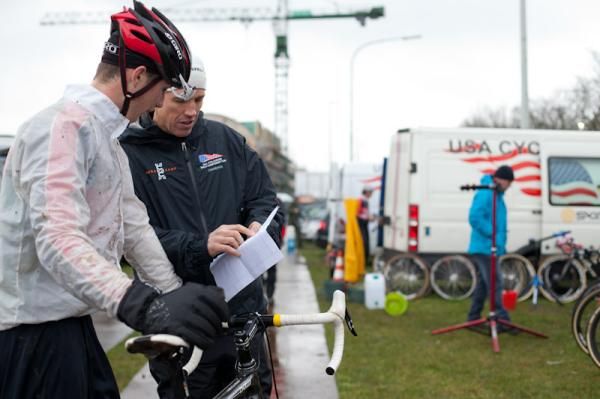 Zane Godby talking to Euro 'Cross Camp director Geoff Proctor before the start at Diegem