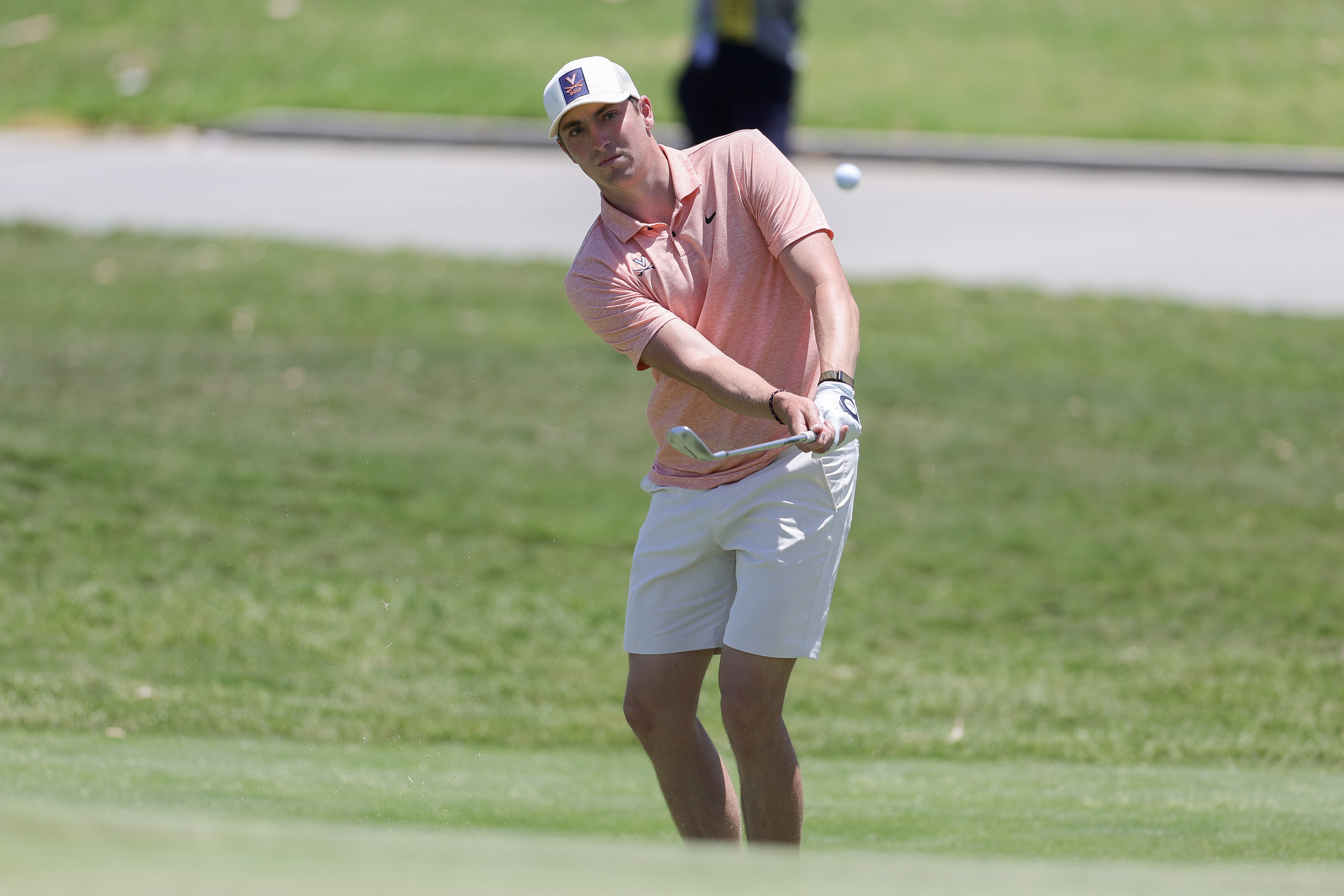 Ben James hits a chip from the edge of the green