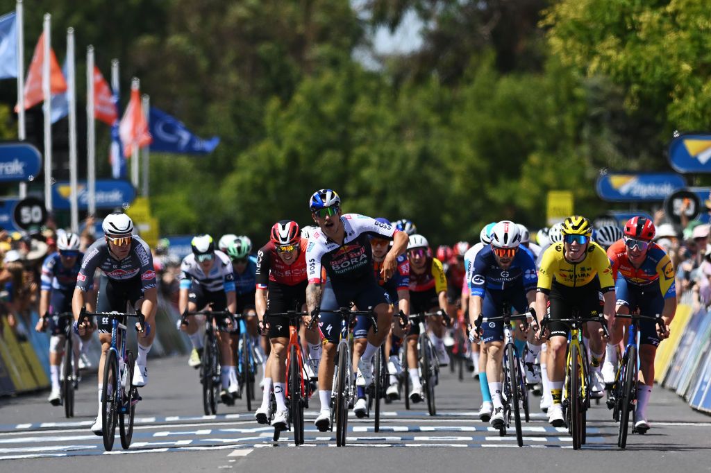 GUMERACHA AUSTRALIA JANUARY 21 A general view of Sam Welsford of Australia and Team Red Bull BORA hansgrohe celebrates at finish line as stage winner ahead of Matthew Brennan of The United Kingdom and Team Visma Lease A Bike Matthew Walls of The United Kingdom and Team Groupama FDJ Tim Torn Teutenberg of Germany and Team Lidl Trek Ben Swift of The United Kingdom and Team INEOS Grenadiers and Simon Dehairs of Belgium and Team AlpecinDeceuninck during the 25th Santos Tour Down Under 2025 Stage 1 a 1507km stage from Prospect to Gumeracha 342m UCIWT on January 21 2025 in Gumeracha Australia Photo by Dario BelingheriGetty Images