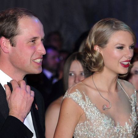 Prince William, Duke of Cambridge and Taylor Swift attend the Winter Whites Gala In Aid Of Centrepoint on November 26, 2013 in London, England.