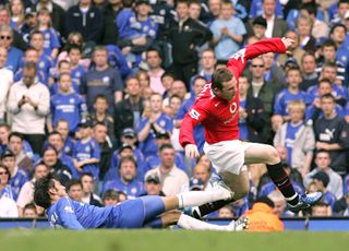 Wayne Rooney is tackled in Manchester United's trip to Chelsea in 2006