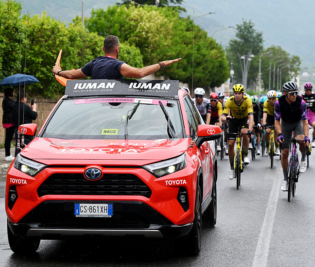 The Giro d'Italia race director slows the peloton