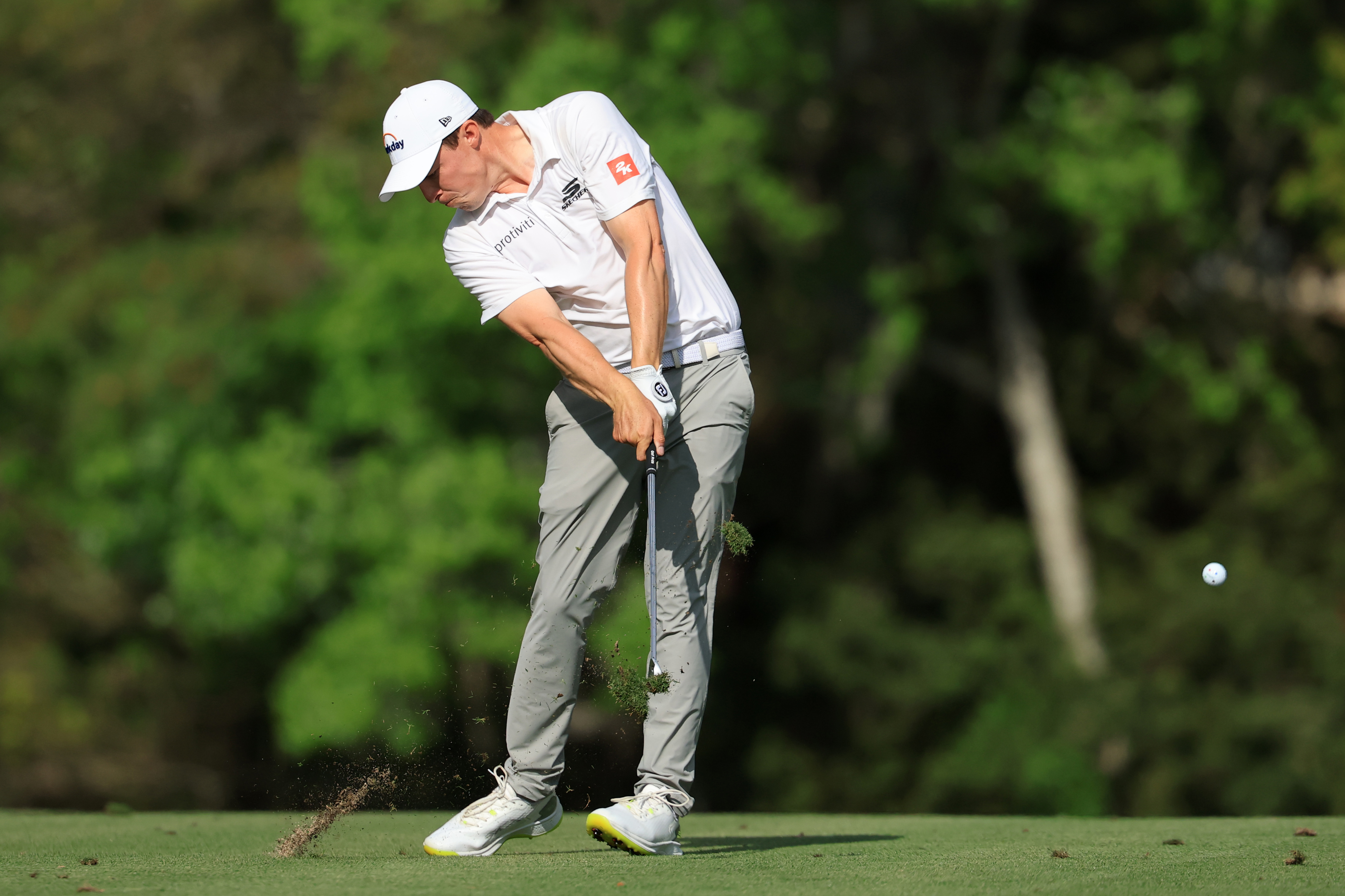 PONTE VEDRA BEACH, FLORIDA - MARCH 15: Matt Fitzpatrick of England hits his second shot on the 14th hole during the final round of THE PLAYERS Championship 2026 at THE PLAYERS Stadium course at TPC Sawgrass on March 15, 2026 in Ponte Vedra Beach, Florida. (Photo by David Cannon/Getty Images)