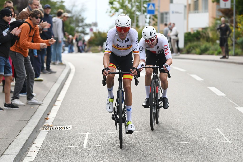 ZURICH SWITZERLAND SEPTEMBER 29 LR Enric Mas of Team Spain and Marc Hirschi of Team Switzerland compete in the chase group during the 97th UCI Cycling World Championships Zurich 2024 Mens Elite Road Race a 2739km one day race from Winterthur to Zurich on September 29 2024 in Zurich Switzerland Photo by Dario BelingheriGetty Images