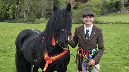 Bronte Crosby and Fell pony stallion Oscar II smile for the camera after claiming the stallion and supreme championships at the 2026 Fell Pony Society Stallion and Colt Show.