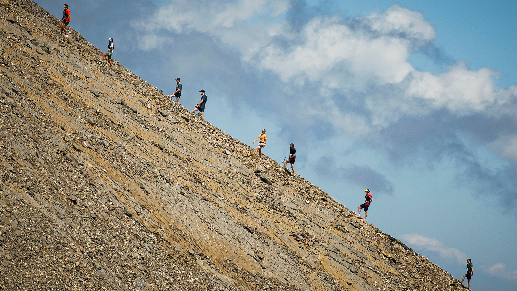 Participants approach the finish line of the Glacier 3000 Run, a 26km course that ascends the Tsanfleuron glacier near Les Diablerets in Switzerland