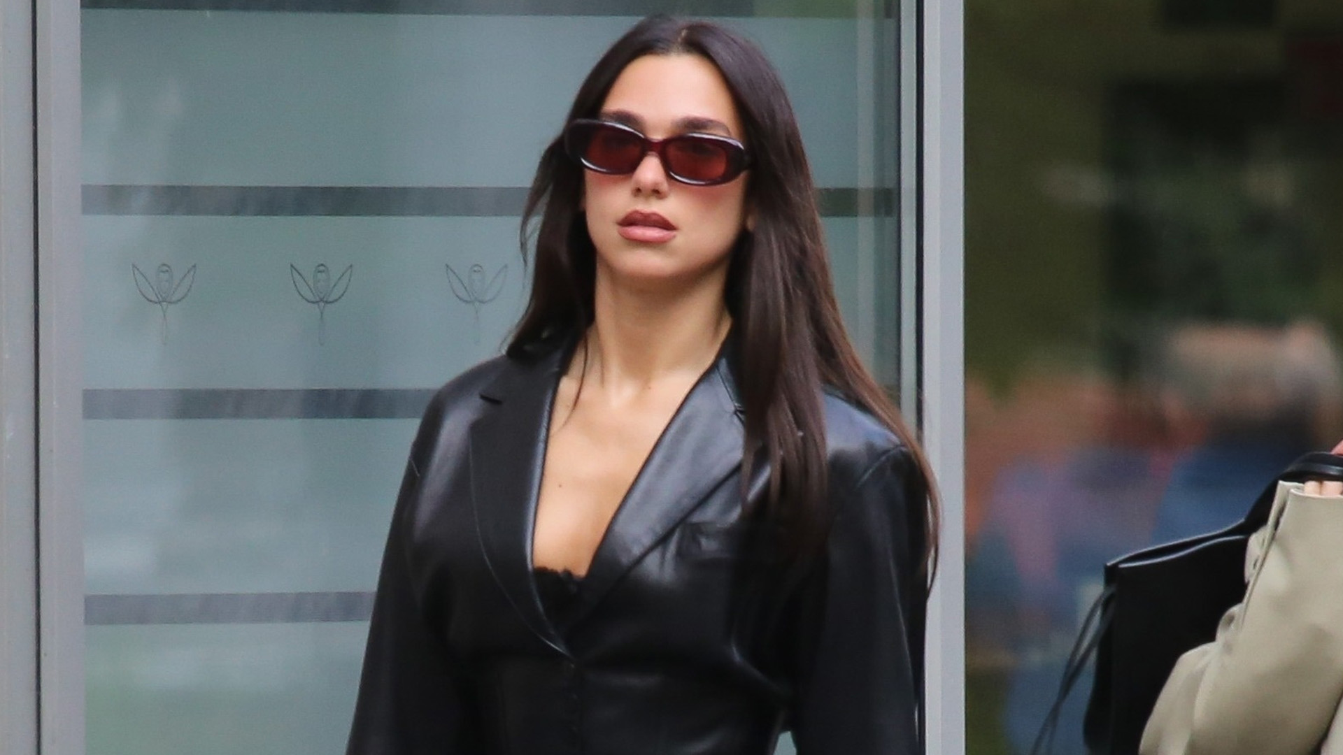 Dua Lipa leather blazer jeans