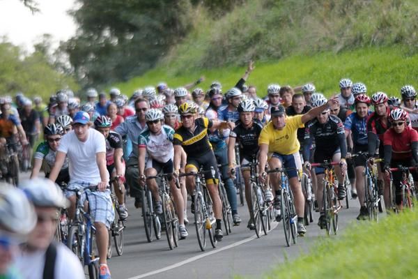 Lance Armstrong has plenty of company as he rides through Dublin, Ireland's Phoenix Park on Tuesday.