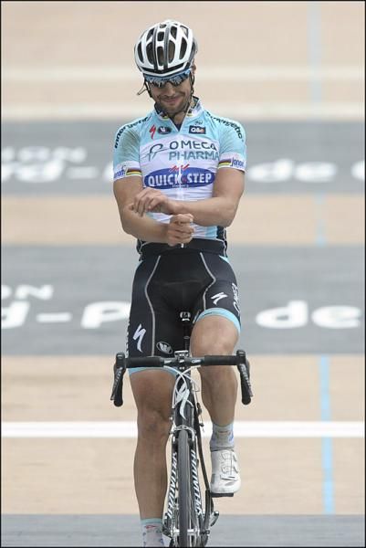A smiling Tom Boonen rolls across the Paris-Roubaix finish line as race winner for the fourth time.
