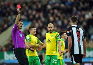 Newcastle United’s Ciaran Clark is sent off during the Premier League match between Newcastle United and Norwich City at St James’ Park, Newcastle. Picture date: Tuesday November 30, 2021