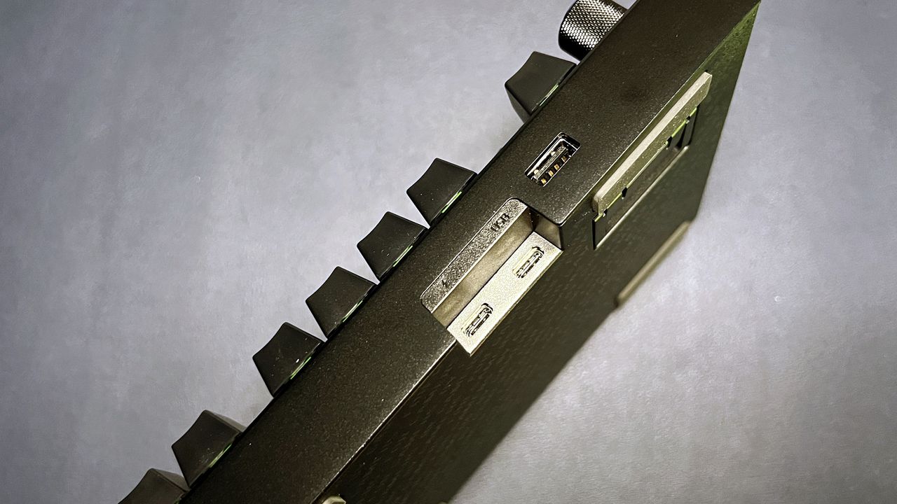 top of BlackWidow V4 Pro gaming keyboard, showing USB port and pass-through port