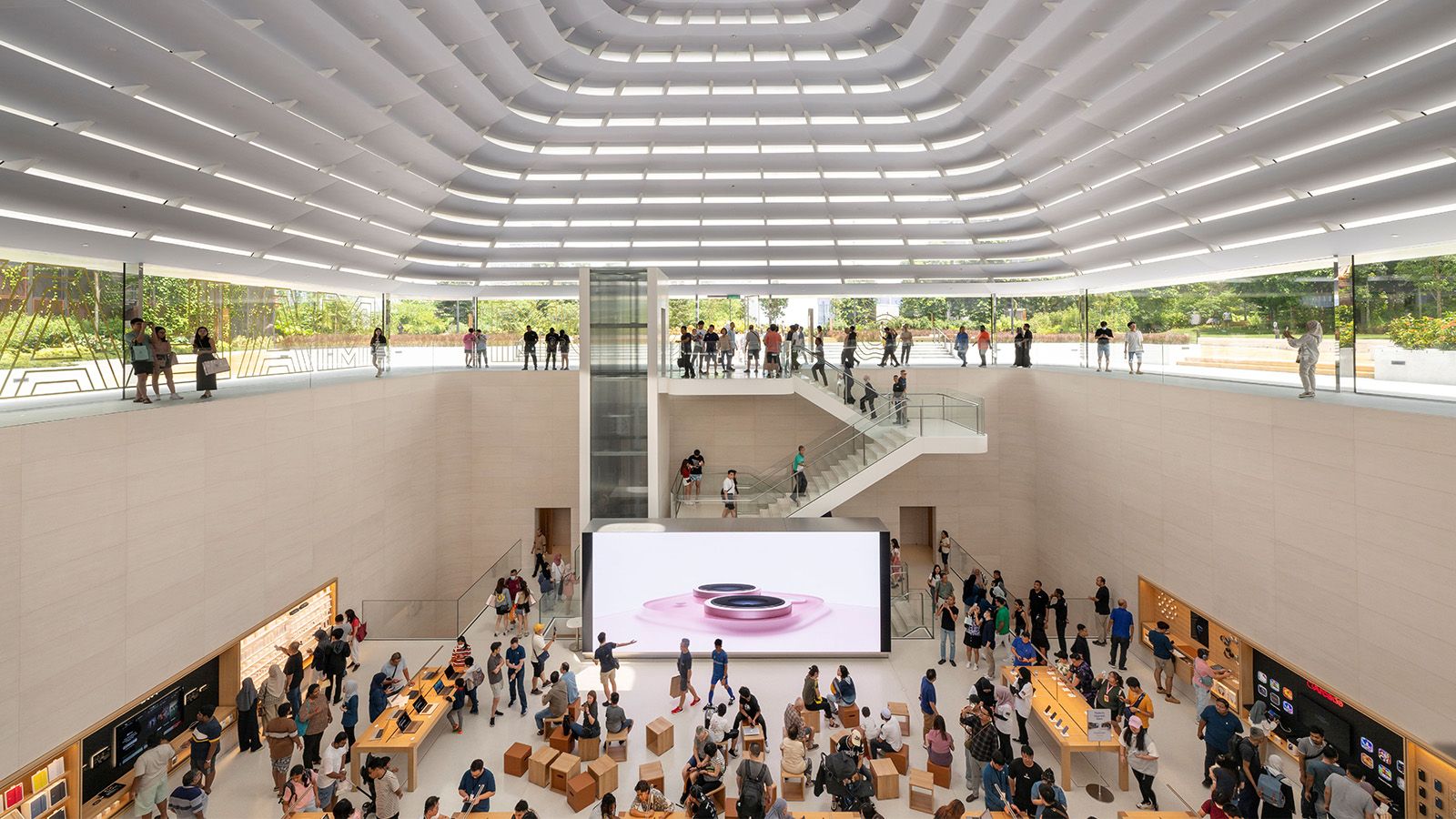 Apple store interior beneath domed roof