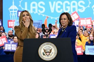 A photo of Jennifer Lopez posing with Kamala Harris after stumping for the presidential candidate at a Las Vegas rally.