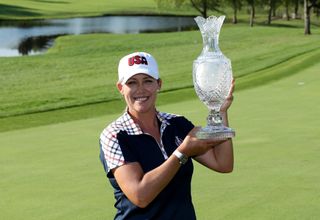 Christie Kerr holds the Solheim Cup trophy