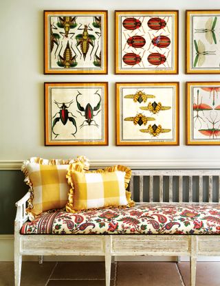 How to decorate above a sofa with symmetrical art