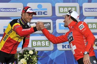 Tom Boonen congratulates race winner Fabian Cancellara on the podium.