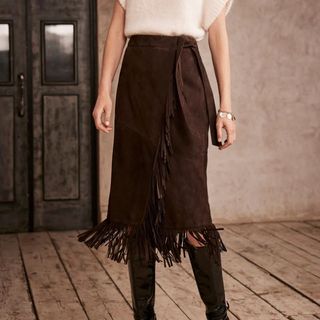 Image of a woman wearing a brown skirt